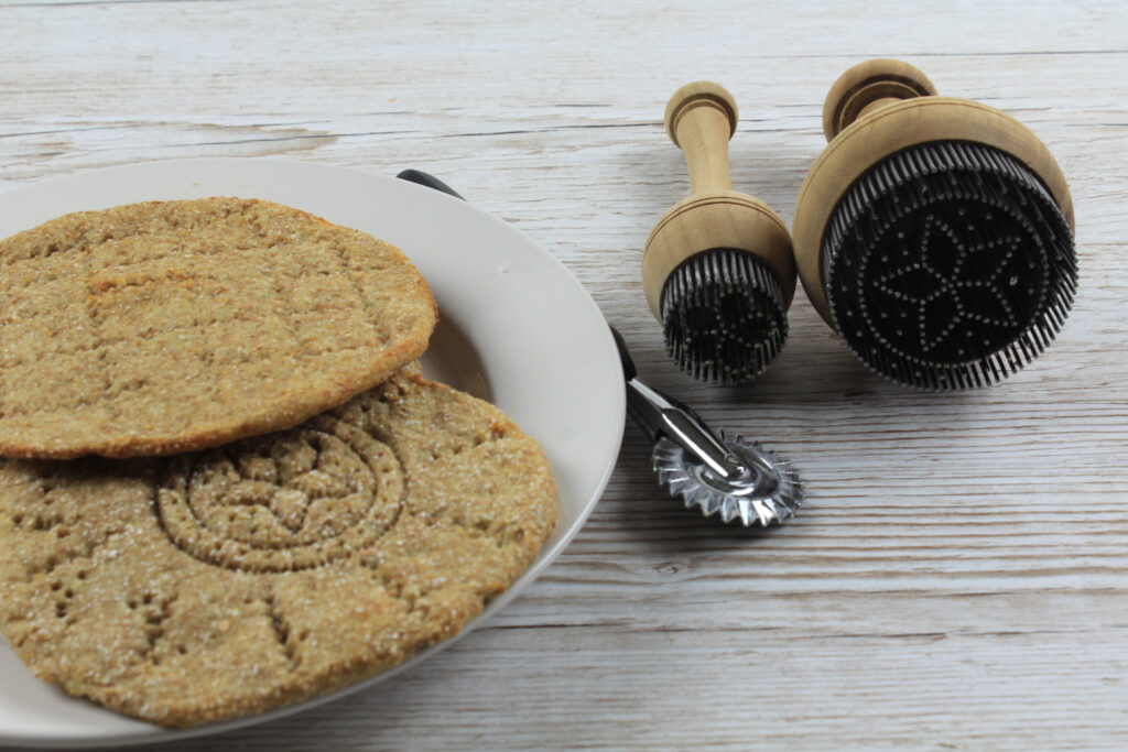 Rieska Finnish Flatbread with pastry wheel and bread stamps