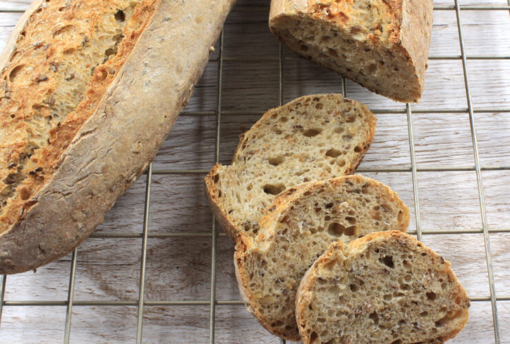 Five Grain Sourdough Rye Baguettes on cooling rack