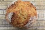 Sourdough Cheddar Herb Soda Bread on Cooling Rack