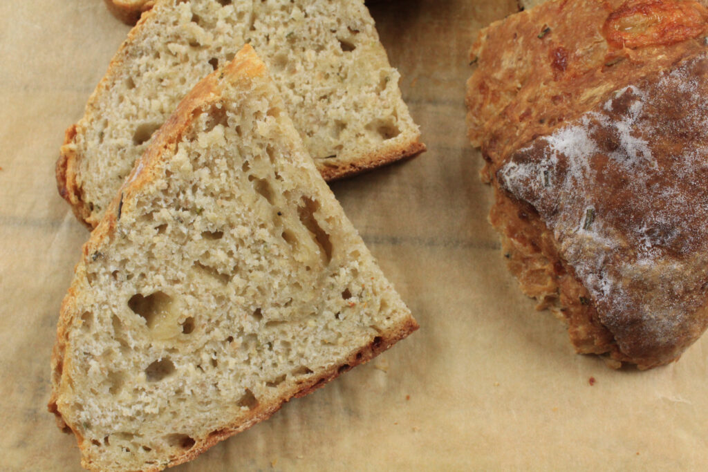 Cheesy Sourdough Soda Bread with Herbs ready to eat