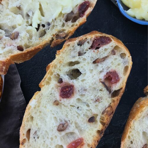 cranberry pecan baguette slices close up