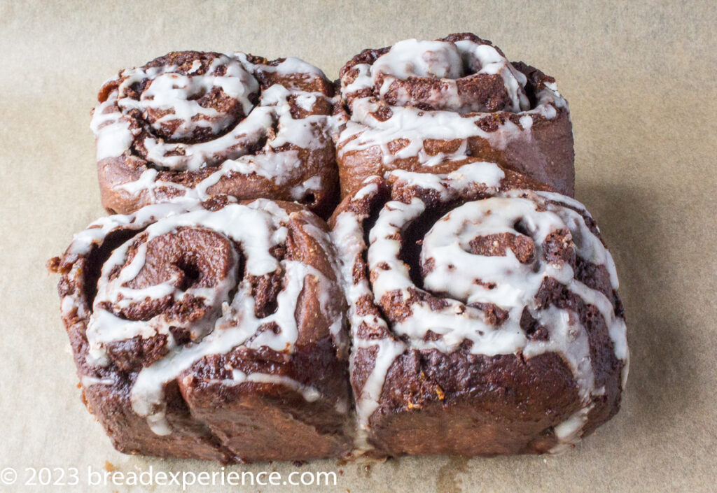 Glazed Chocolate sweet roll dough swirled around a chocolatey/orange filling